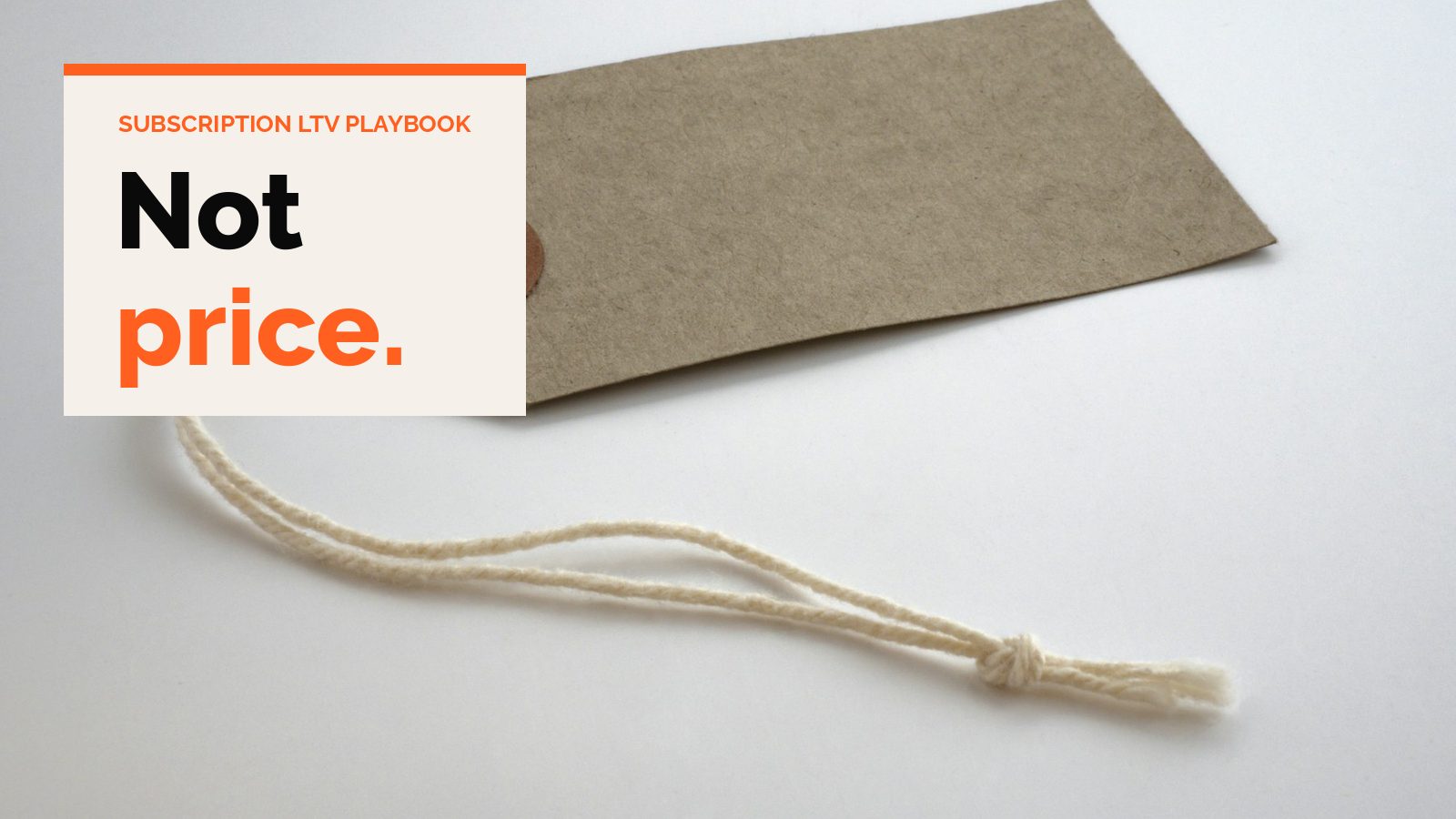 A blank brown paper price tag with a string